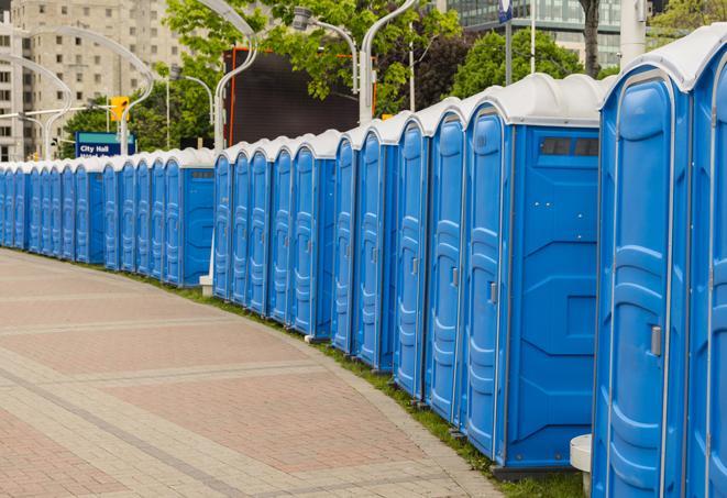 a line of portable restrooms at a sporting event, providing athletes and spectators with clean and accessible facilities in Beech Grove, AR